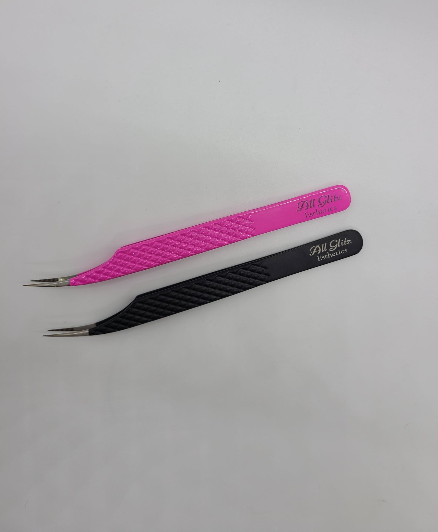 Fibre tip curved isolation tweezers